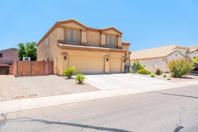 3511 W Allens Peak Dr, San Tan Valley, AZ 85144 - view of front facade featuring a gate, a tile roof, stucco siding, and a garage
