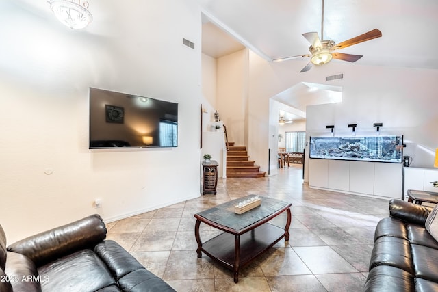 3511 W Allens Peak Dr, San Tan Valley, AZ 85144 - living area featuring ceiling fan, high vaulted ceiling, stairway, and light tile patterned flooring