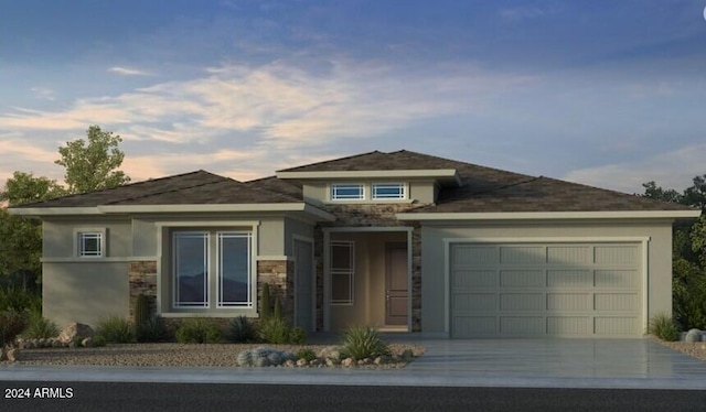 view of front of property featuring a garage