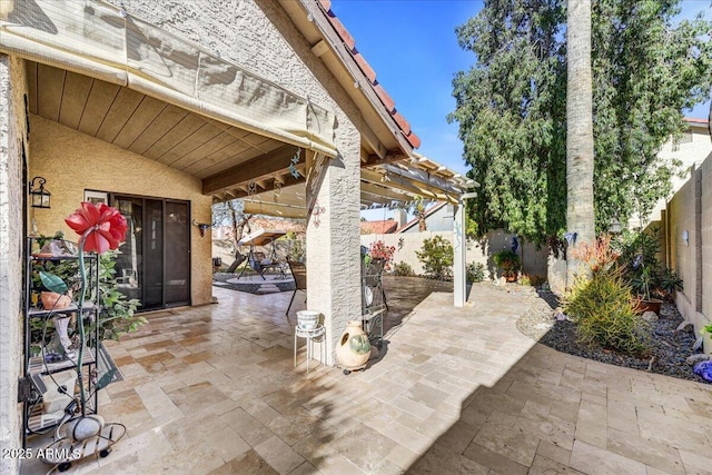 view of patio featuring a pergola