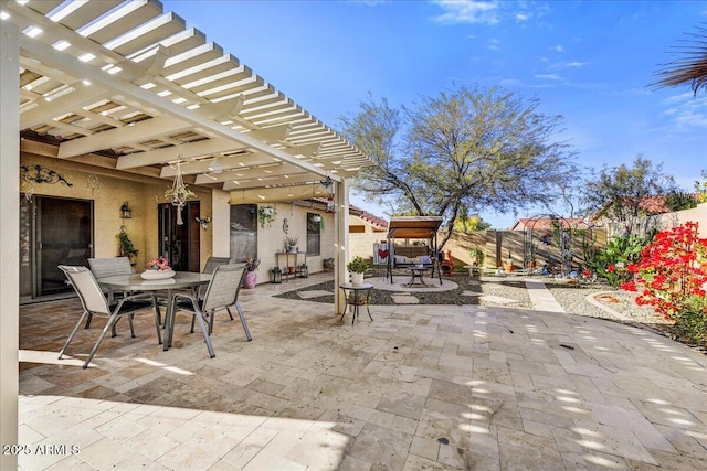 view of patio featuring a pergola