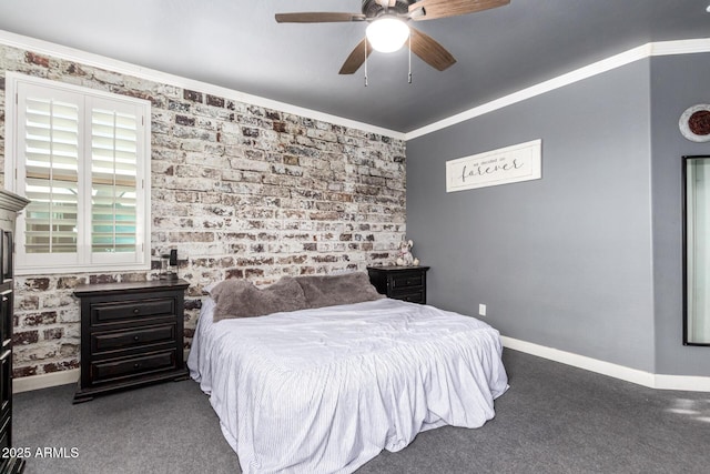 bedroom featuring crown molding, carpet flooring, and baseboards