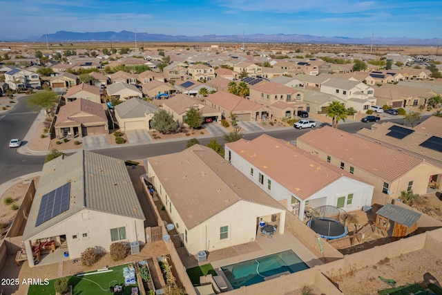 aerial view featuring a mountain view and a residential view