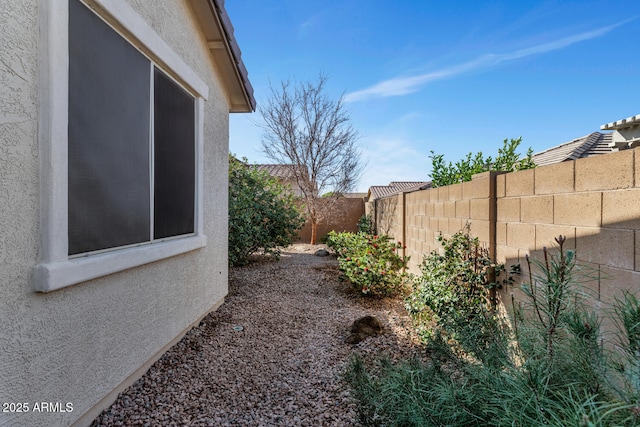 view of yard featuring a fenced backyard