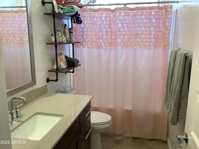 full bathroom featuring vanity, toilet, tile patterned flooring, and shower / bath combo