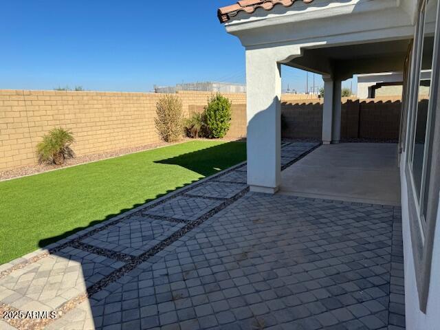 view of patio with a fenced backyard