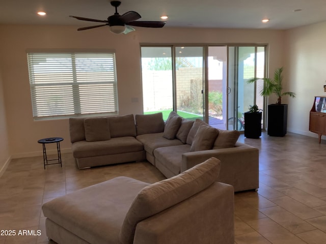 living room with ceiling fan, baseboards, light tile patterned flooring, and recessed lighting