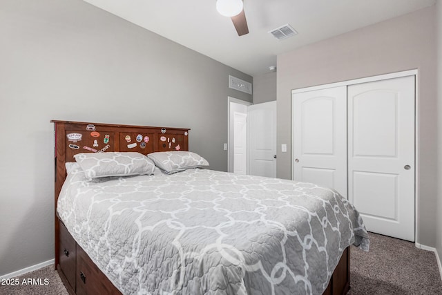 carpeted bedroom featuring ceiling fan, a closet, visible vents, and baseboards