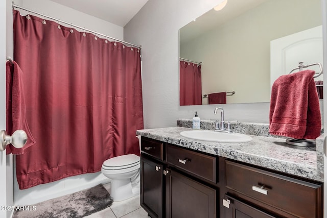 full bath featuring tile patterned flooring, vanity, and toilet