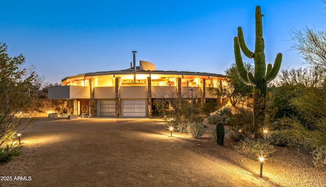 view of front of property with a garage