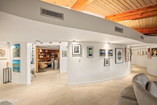 living room featuring vaulted ceiling with beams and wood ceiling