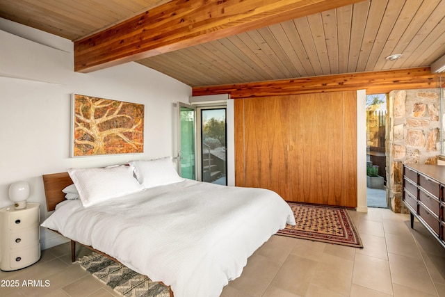 bedroom featuring beamed ceiling, access to exterior, light tile patterned floors, and wooden ceiling