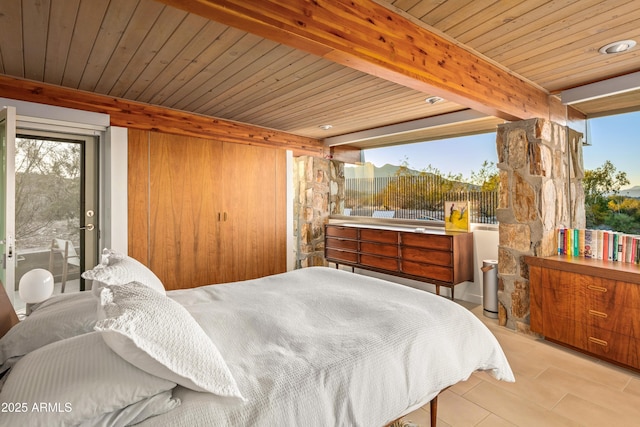 bedroom featuring beamed ceiling, wood ceiling, access to exterior, and multiple windows