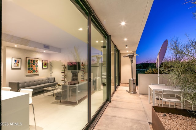 balcony featuring a patio and an outdoor hangout area