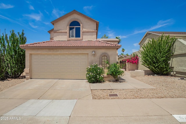 19230 N 5th St, Phoenix, AZ 85024 - mediterranean / spanish house with stucco siding, a tiled roof, concrete driveway, and a garage