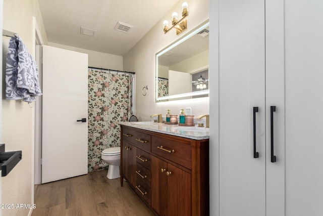 19230 N 5th St, Phoenix, AZ 85024 - bathroom featuring wood finished floors and double vanity