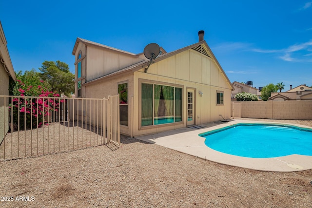 19230 N 5th St, Phoenix, AZ 85024 - rear view of house with a fenced backyard, a patio area, and board and batten siding