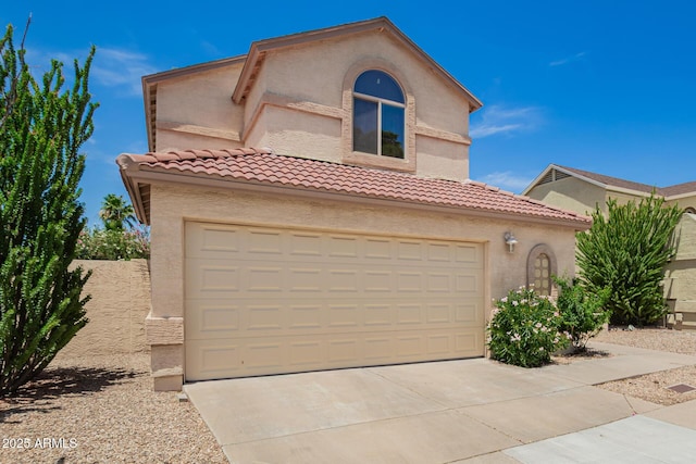 19230 N 5th St, Phoenix, AZ 85024 - mediterranean / spanish house featuring a tiled roof, stucco siding, driveway, and an attached garage