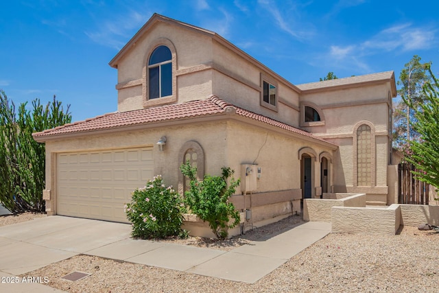 19230 N 5th St, Phoenix, AZ 85024 - mediterranean / spanish home with concrete driveway, stucco siding, and a garage