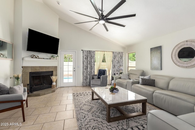 19230 N 5th St, Phoenix, AZ 85024 - living area with a ceiling fan, high vaulted ceiling, healthy amount of natural light, a fireplace, and light tile patterned flooring