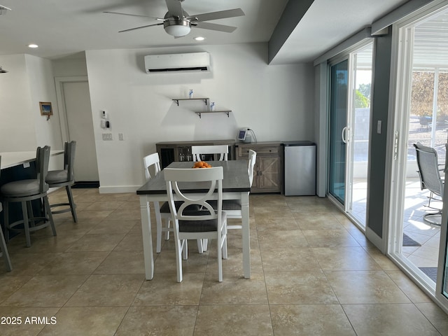 dining room featuring light tile patterned floors, baseboards, a ceiling fan, an AC wall unit, and recessed lighting