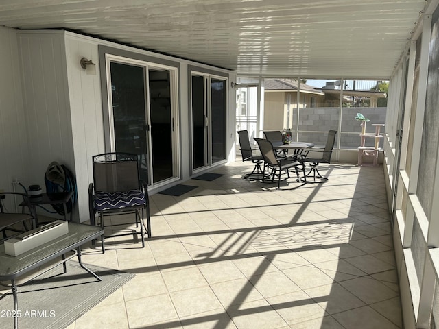 sunroom featuring a healthy amount of sunlight