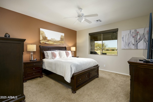 bedroom featuring visible vents, ceiling fan, light carpet, and baseboards