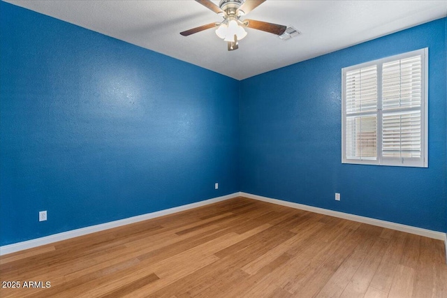 10235 E Jerome Ave, Mesa, AZ 85209 - spare room featuring wood finished floors and ceiling fan