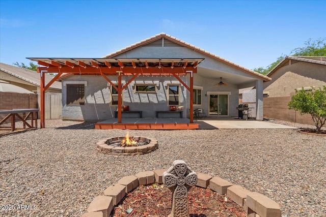 10235 E Jerome Ave, Mesa, AZ 85209 - back of property with a fire pit, a ceiling fan, a fenced backyard, and a tiled roof