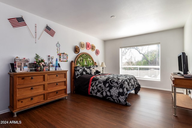 bedroom featuring dark wood-type flooring