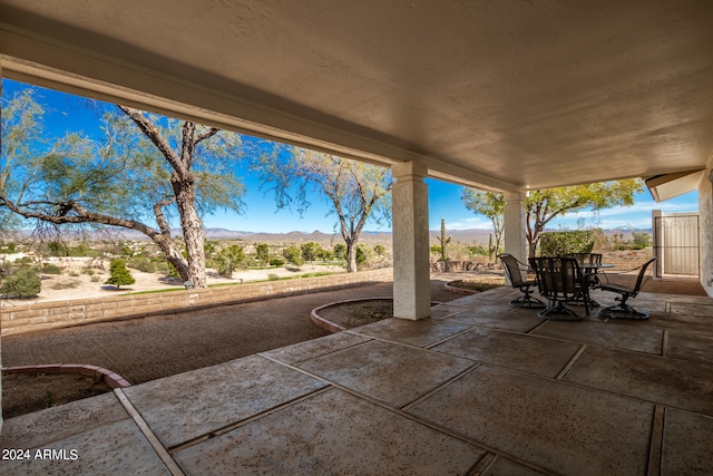 view of patio with a mountain view