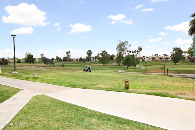 7777 E Main St Unit 227, Scottsdale, AZ 85251 - view of community featuring a yard and view of golf course