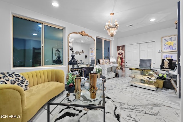 living room featuring a notable chandelier