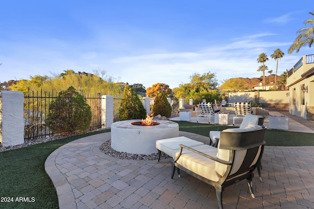 view of patio featuring an outdoor fire pit