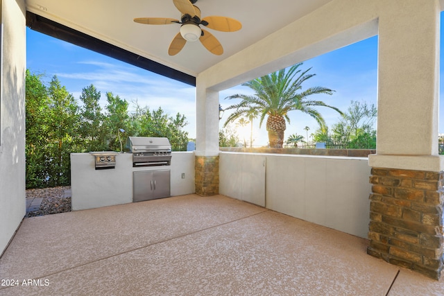 view of patio / terrace with an outdoor kitchen, a grill, and ceiling fan