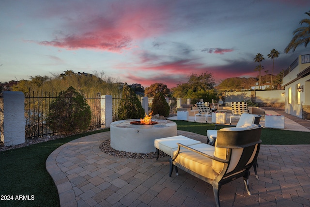 patio terrace at dusk with an outdoor fire pit