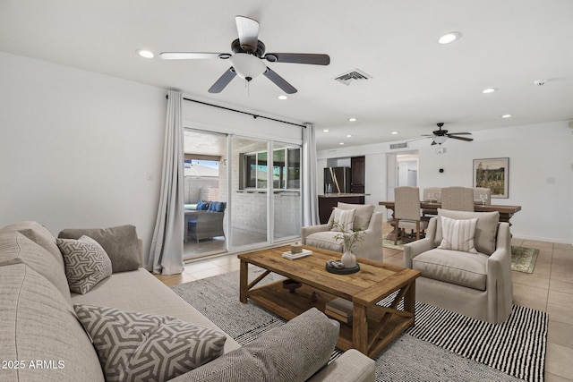 2519 E Geneva Dr, Tempe, AZ 85282 - living area with a ceiling fan, light tile patterned flooring, and recessed lighting