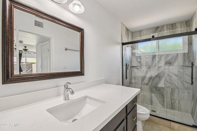 2519 E Geneva Dr, Tempe, AZ 85282 - full bathroom with vanity, a shower stall, tile patterned flooring, and a ceiling fan
