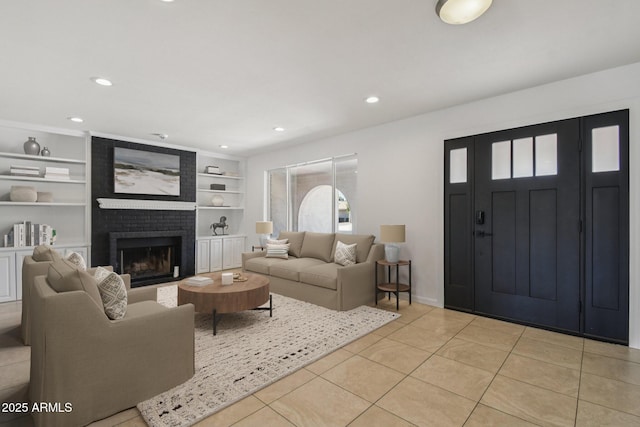 2519 E Geneva Dr, Tempe, AZ 85282 - living area featuring a brick fireplace, recessed lighting, light tile patterned flooring, and built in features