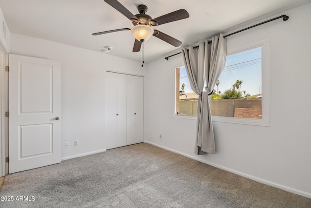 2519 E Geneva Dr, Tempe, AZ 85282 - unfurnished bedroom featuring carpet flooring, a closet, and a ceiling fan