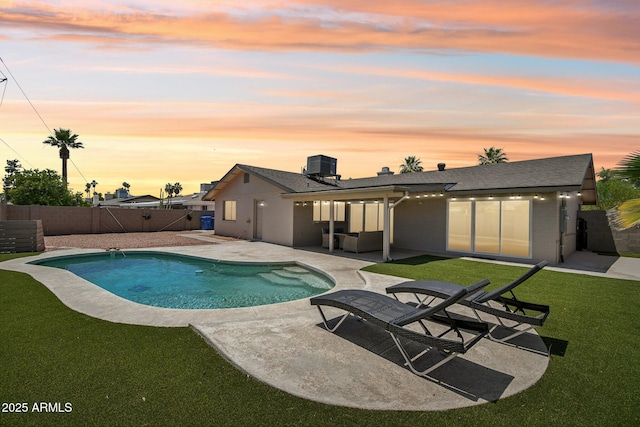 2519 E Geneva Dr, Tempe, AZ 85282 - pool at dusk featuring a fenced backyard and a patio