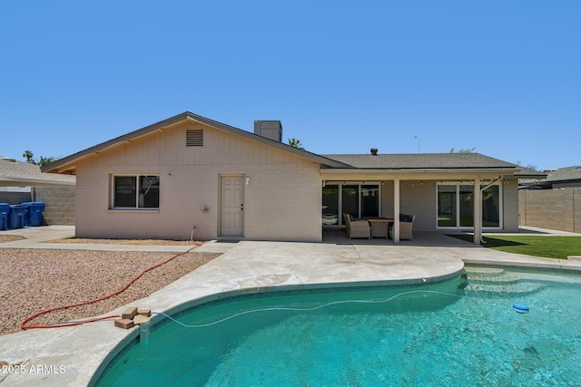 2519 E Geneva Dr, Tempe, AZ 85282 - back of house featuring a chimney, a patio area, and brick siding