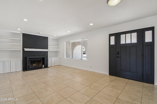 2519 E Geneva Dr, Tempe, AZ 85282 - entryway featuring recessed lighting, a fireplace, and light tile patterned flooring