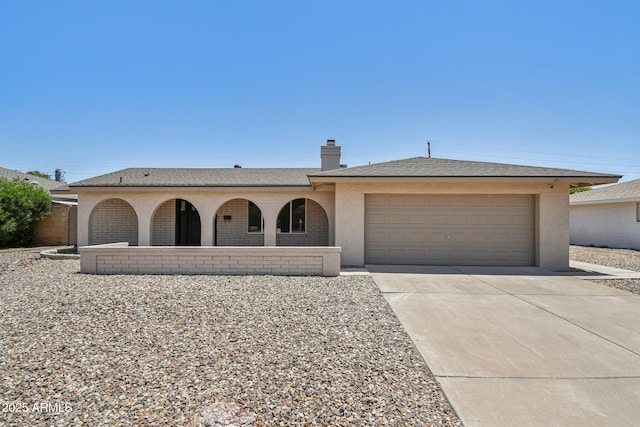 2519 E Geneva Dr, Tempe, AZ 85282 - view of front facade featuring a garage, concrete driveway, a chimney, covered porch, and stucco siding