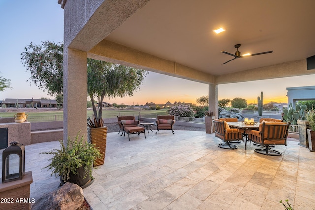 patio terrace at dusk with ceiling fan