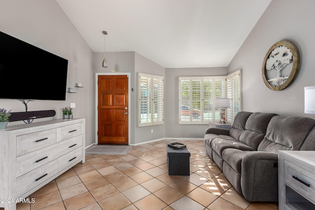 tiled living room with lofted ceiling