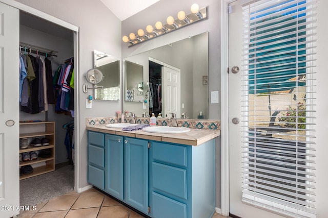 bathroom with vanity and tile patterned floors