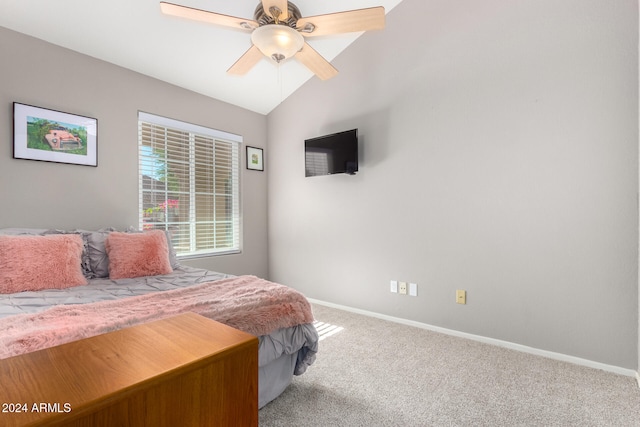 carpeted bedroom featuring vaulted ceiling and ceiling fan