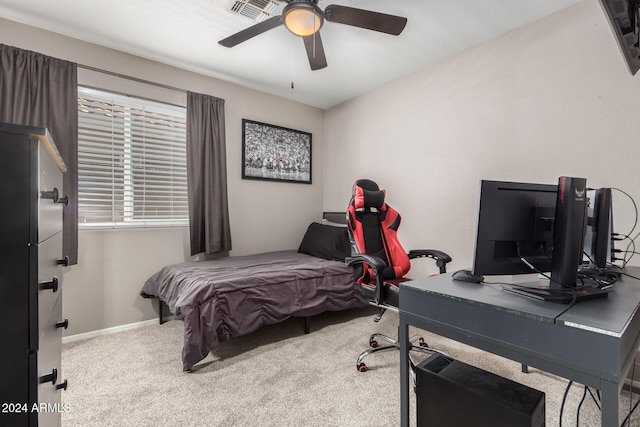 bedroom featuring ceiling fan and light colored carpet