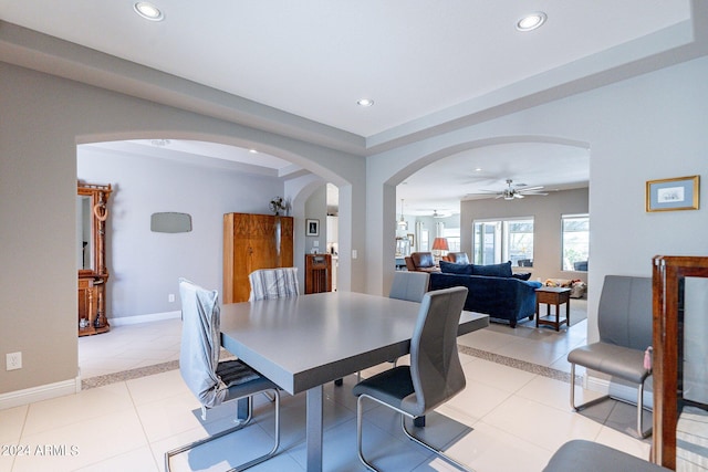 dining area featuring light tile patterned floors and ceiling fan